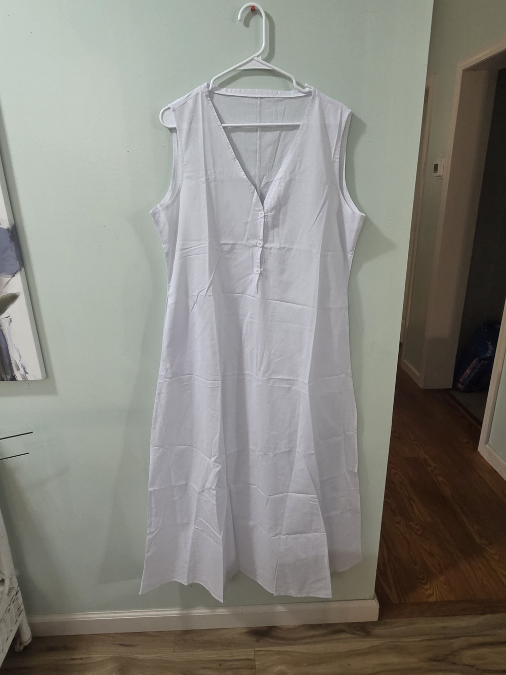 Sleeveless White Maxi Dress with V-Neck Button Front